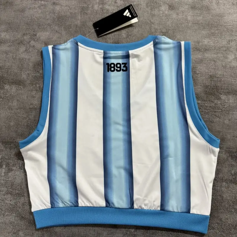 Top corto Argentina 2026 Home Mundial Azul/Blanco Mujer