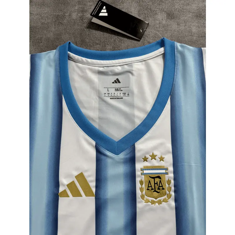 Top corto Argentina 2026 Home Mundial Azul/Blanco Mujer