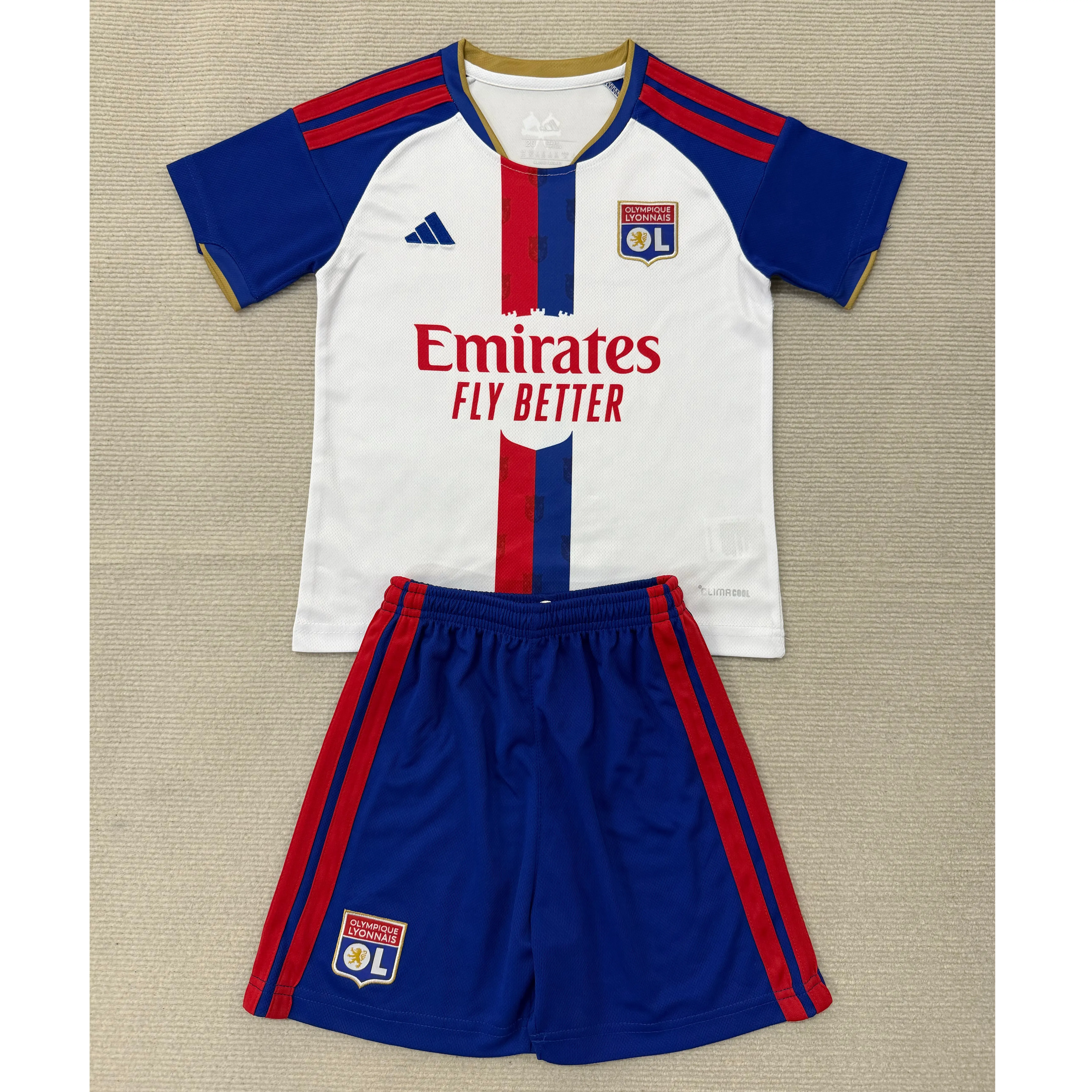 Camiseta Olympique De Lyon Home Equipación 2026/2027 Blanco/Azul Niño Kit
